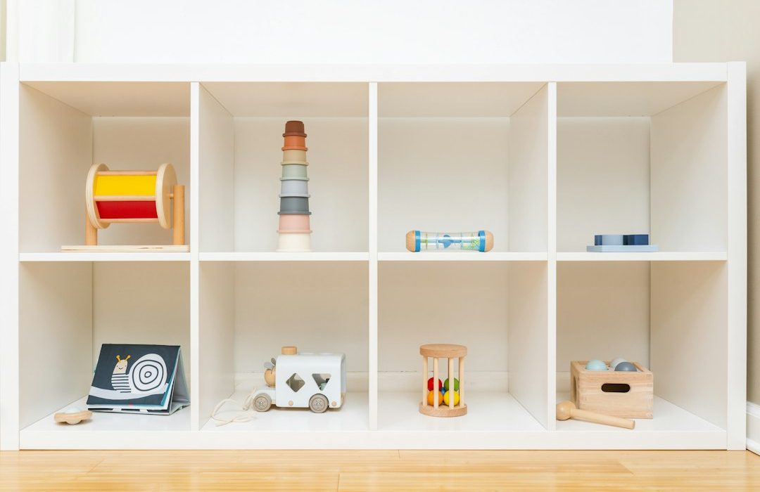 a shelf filled with lots of different types of toys